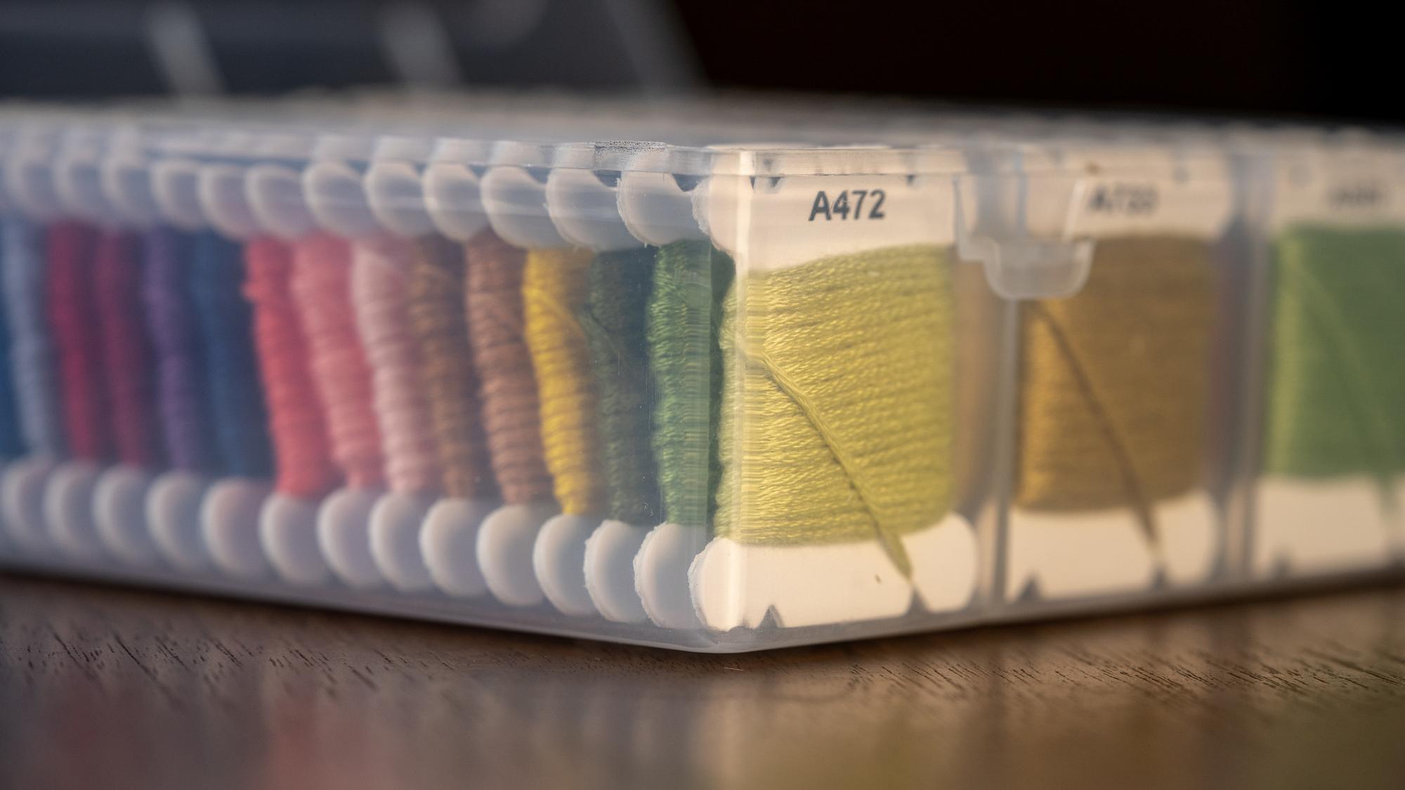 Stack of finished embroidered samples